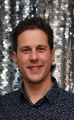 Portrait of Ty Ouellet, Associate.